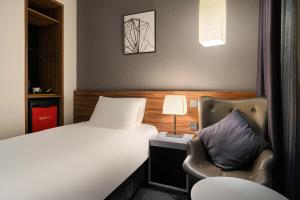 Staz Hotel Ulsan客房内的一张或多张床位
