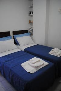 Ένα ή περισσότερα κρεβάτια σε δωμάτιο στο Trezza view apartment +38 φωτογραφίες