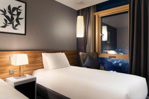 Staz Hotel Ulsan客房内的一张或多张床位