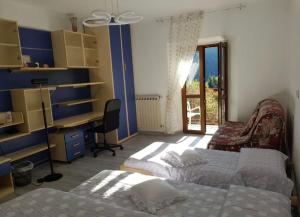 A bed or beds in a room at Fuga in montagna Casa indipendente mezzo montagna con barbecue