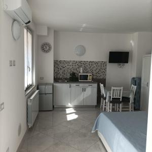 A kitchen or kitchenette at Fiordaliso B&B