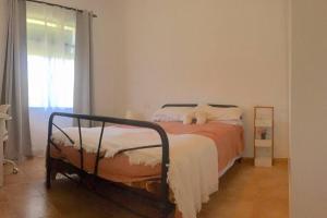 A bed or beds in a room at Casa La Soleá Cerro Muriano
