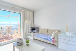 TV a/nebo společenská místnost v ubytování Mallorca 15 Canyelles Roses - Immo Barneda