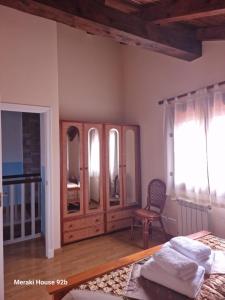 A bed or beds in a room at Meraki House 92B