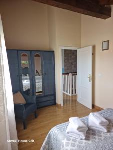 A bed or beds in a room at Meraki House 92B