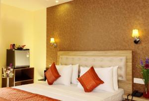 Postel nebo postele na pokoji v ubytování Hotel Aeroporto Nearest Landmark Aerocity delhi