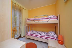 A bed or beds in a room at Messaga Még 11 kép