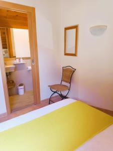 Łóżko lub łóżka w pokoju w obiekcie Duplex Playa de Rons