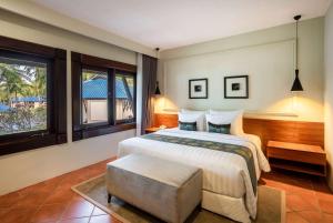 Voodi või voodid majutusasutuse Sundancer Residences and Villas Lombok toas