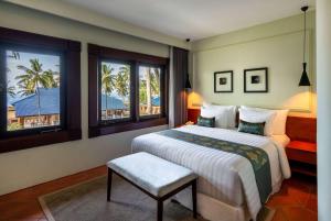 Voodi või voodid majutusasutuse Sundancer Residences and Villas Lombok toas