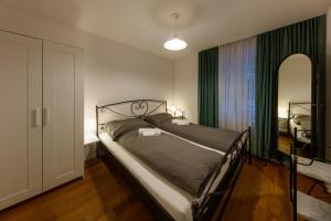 Postel nebo postele na pokoji v ubytování Welcome Apartments - Luzern