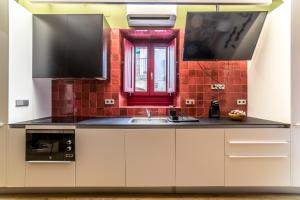 A kitchen or kitchenette at Casa Roja