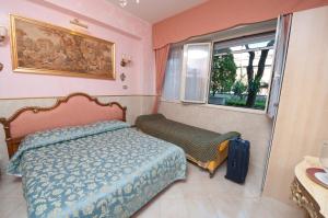 Postel nebo postele na pokoji v ubytování B&B Babri Simim Taj