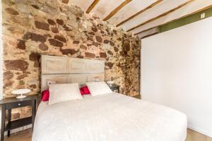 A bed or beds in a room at Casa Roja