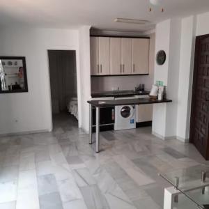 Kuchnia lub aneks kuchenny w obiekcie Pueblo Evita apartment in exclusive holiday complex