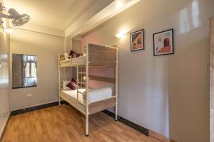 Postel nebo postele na pokoji v ubytování Zostel Shillong