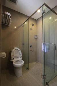 Een badkamer bij Java Go Residence by Jiwa Jawa