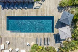 Bazén v ubytovaní Appartements Les Lofts de Sainte-Lucie-de-Porto-Vecchio alebo v jeho blízkosti