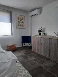 Postel nebo postele na pokoji v ubytování Appartements Les Lofts de Sainte-Lucie-de-Porto-Vecchio + 33 fotografií