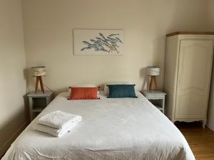 Posteľ alebo postele v izbe v ubytovaní Les Bains de Trouville