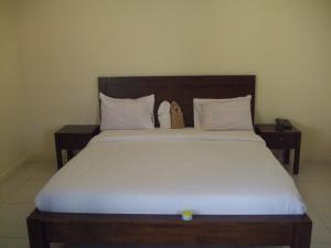 Cama o camas de una habitación en Baan Kittima