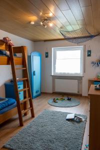 Postel nebo postele na pokoji v ubytování Ferienwohnung Hertreiter in Dingolfing 110qm