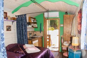 a bedroom with a bed and a sink in a room at Vintage Provence in Arles