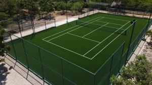 Instalaciones para jugar a tenis o squash en Zanzibar White Sand Luxury Villas & Spa - Relais & Chateaux o alrededores