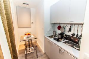 
A cozinha ou cozinha compacta de Calisto Luxury Trastevere
