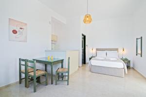 Posteľ alebo postele v izbe v ubytovaní Eolos Apartments