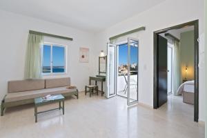 Posteľ alebo postele v izbe v ubytovaní Eolos Apartments