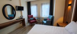 Postel nebo postele na pokoji v ubytování Star Hotel