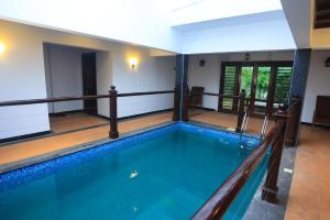 Bazén v ubytování Heaven Inn Munnar nebo v jeho okolí