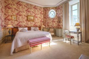 Château La Comtesse de Loire & Spa客房内的一张或多张床位