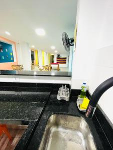 Kuchyň nebo kuchyňský kout v ubytování Hostel Recanto da Paciência