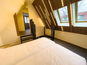 Postel nebo postele na pokoji v ubytování Villa Vindina