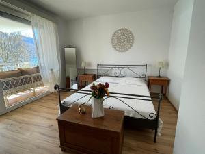 En eller flere senge i et værelse på Minusio-Locarno Casa al Lago 1