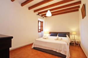 Posteľ alebo postele v izbe v ubytovaní Villa Son Guinyol by Slow Villas