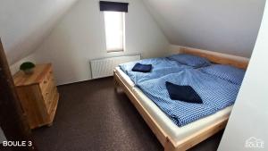 Postel nebo postele na pokoji v ubytování Apartmány Boule
