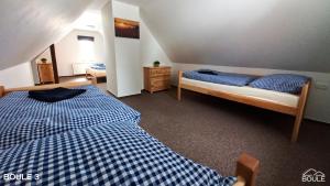 Postel nebo postele na pokoji v ubytování Apartmány Boule