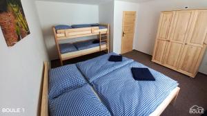 Postel nebo postele na pokoji v ubytování Apartmány Boule