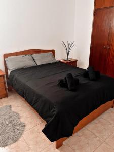 Кровать или кровати в номере Férias sem Carro - Apartamento Praia e Piscina