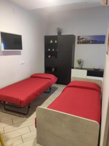 Posteľ alebo postele v izbe v ubytovaní Casa Vacanze Zia Rose