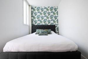 Posteľ alebo postele v izbe v ubytovaní HSH Traversière-Boulogne-Billancourt I Appartement 4P