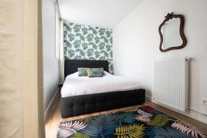 Posteľ alebo postele v izbe v ubytovaní HSH Traversière-Boulogne-Billancourt I Appartement 4P