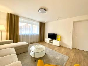TV a/nebo společenská místnost v ubytování Apartmán Samuel Prievidza