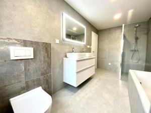 Koupelna v ubytování Apartmán Samuel Prievidza