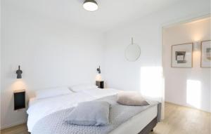 Ένα ή περισσότερα κρεβάτια σε δωμάτιο στο Beach Front Apartment