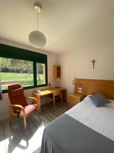 Postel nebo postele na pokoji v ubytování Casa Santa Elena + 37 fotografií