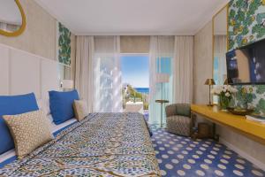 Cama ou camas em um quarto em Bela Vista Hotel & Spa - Relais & Chateaux